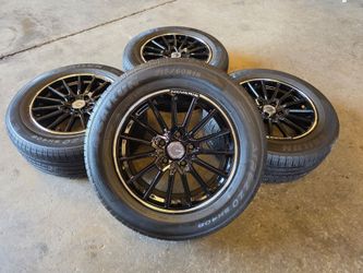 16 inch 5×114.3 brand new wheels and excellent condition 215/60/16 tire for sale