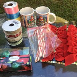 $1 Each. All new. Candles, Mugs, Ribbons And Bows 