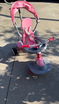 Radio Flyer 4-in-1 Stroll 'N Trike - Pink: Steel Frame, Adjustable Seat, EVA Tires