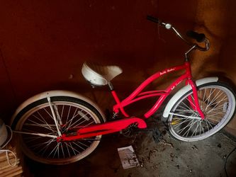 Soft cruiser bike beach  bright pink with bell rusty spokes