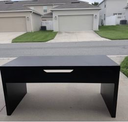 Large black wooden desk — 59.5” x 29” x 25.5”