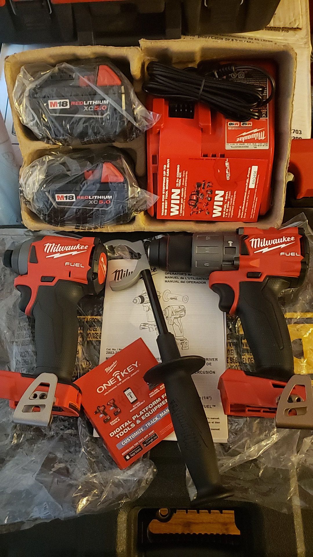 Brand New Milwaukee M18 Fuel . Impact and hammer drill . No box. Brand New charger and batteries.