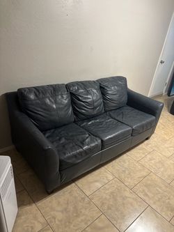 Leather couch with PULLOUT BED