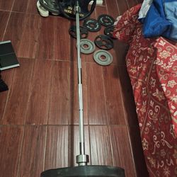 7ft Olimpic Barbell And Weights