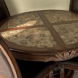 Tommy Bahama style dining table and chairs with marble inlays