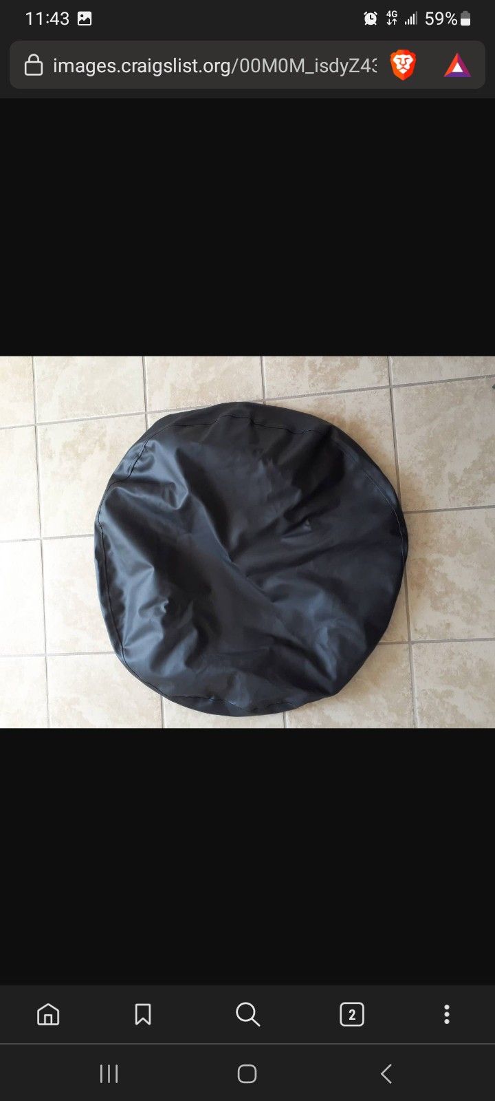 Leather Tire cover (215-70R 16) + 1999 Repair Manual - $20