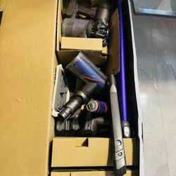 DYSON V6 Vacuum Comes With All The Attachments 