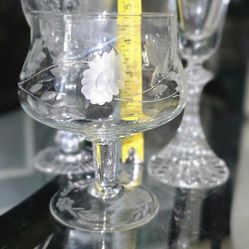 Two Vintage etched crystal glasses.