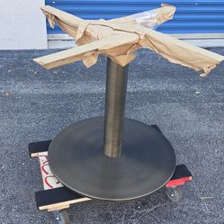 New brass table base. No top.