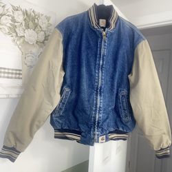 vintage Carhartt JQ0198 denim varsity jacket.