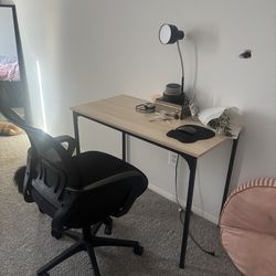 Desk, Rolling chair and black lamp