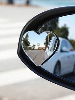 Heart shaped blind spot side view mirror