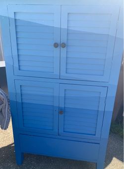 Wooden storage cabinet