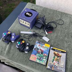 2 Games. 2 Controllers. 1 Mic. All Cables. Nintendo GameCube doc 001 Purple & black doc 101. $180! Per Bundles. Extra Game $25! Or 5 for $100!. Extra 