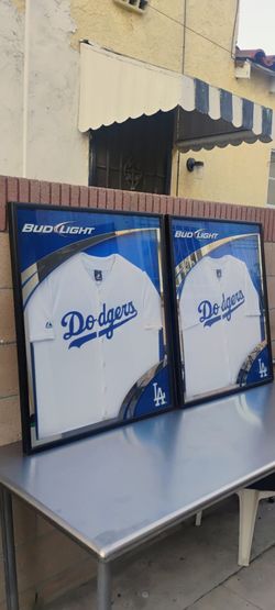 BUD LIGHT / LA DODGERS JERSEYS FRAME. ( ALSO PLENTY OF NEON SIGNS / LIGHTS AVAILABLE FOR SALE )TAP HANDLES DODGERS & ANGELS BOBBLEHEADS AVAILABLE