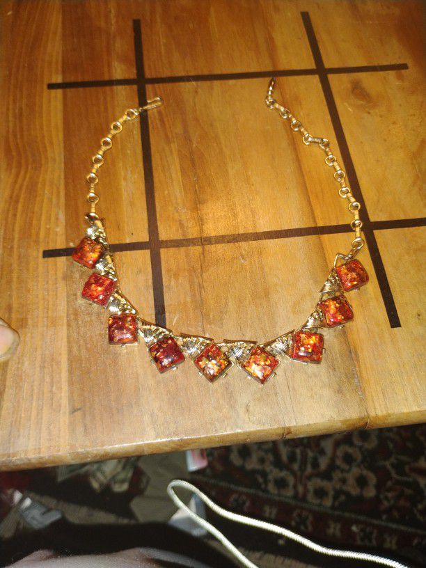 Vintage Coro Red Confetti Lucite Thermoset Necklace. Gold tone 16 inch choker. Signed Coro