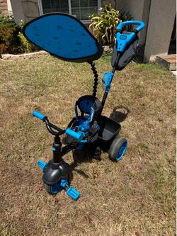 Little Tikes 4-in-1 Ride On, Neon Blue, Deluxe Edition