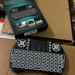Mini wireless keyboard with a touchpad