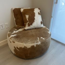 Cow Hide Ottoman On Wheels With Two Pillows 
