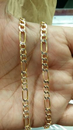 14k Gold diamond cut figaro link 24 inch long 11.7 grams