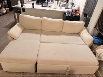 Sectional couch with storage under chaise