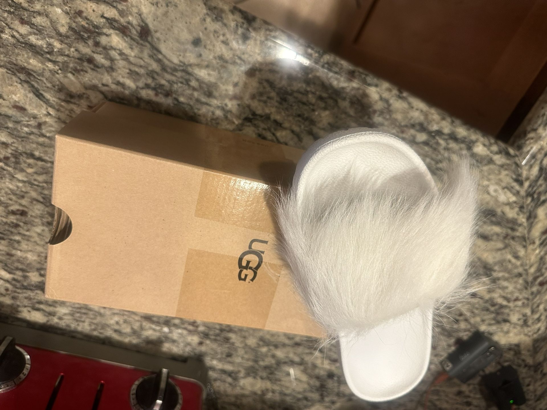 White fur Ugg slides