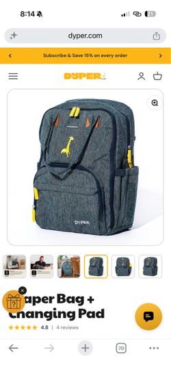 Dyper diaper bag with changing pad