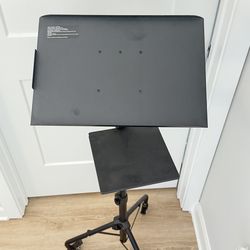 Rolling adjustable podium / laptop stand.