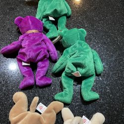 Lot of beanie baby’s with spunky and Pugsly both made from PVC Pugsly has 4th gen tag all in great condition with tags 