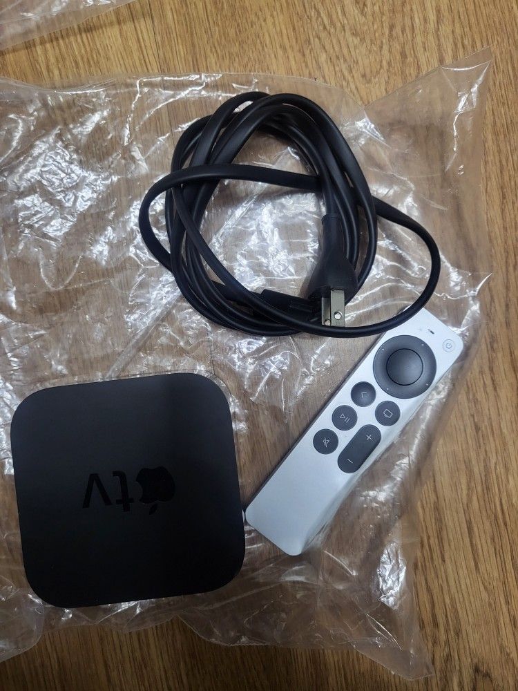 Apple TV 4K HDR 2nd Gen A2169 64GB Media Streamer MXH02LL/A. WiFi and Bluetooth.  Item will receive as shown. If not in pictures,  it's not included. 