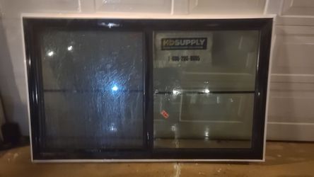Sliding tempered Glass Window with Dark Frame