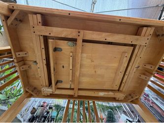 Wooden table set with chairs