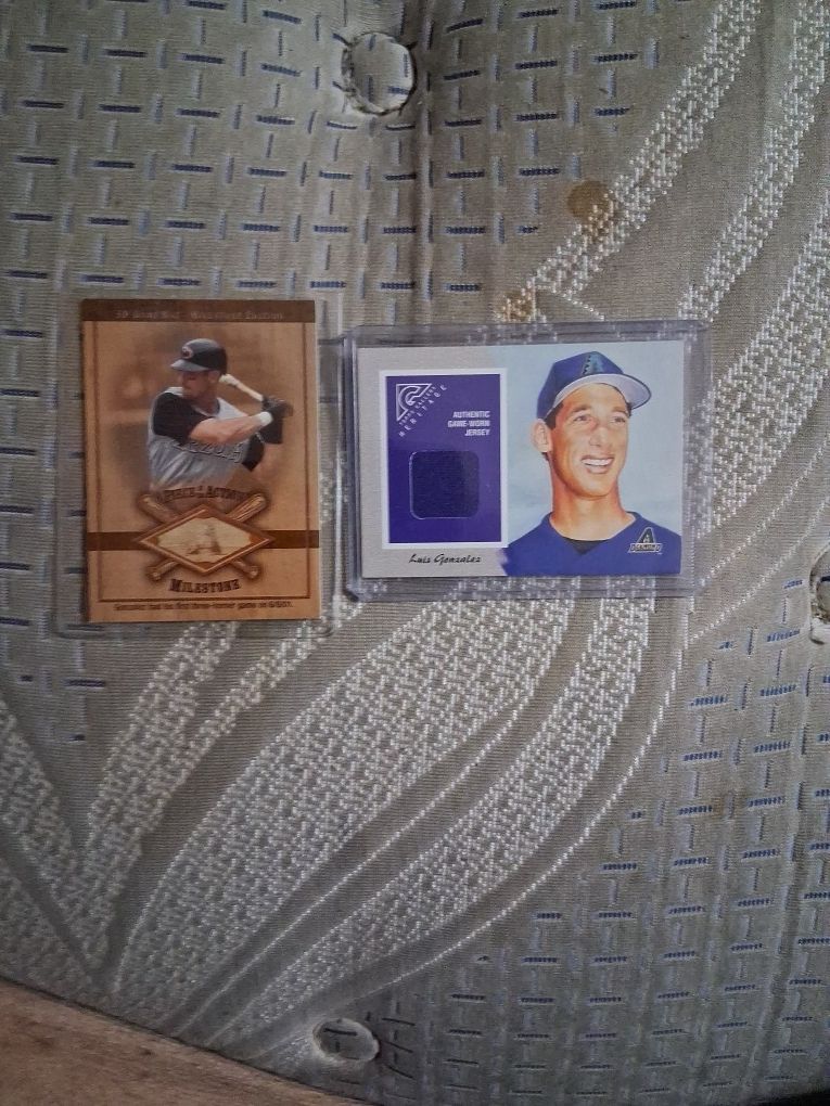 Two 2002 Luis Gonzalez Relic Cards (Pieces Likely From Pryor 2001 Ws Championship Run Season)