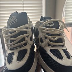 White and navy blue Lv trainers