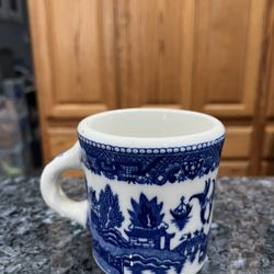 Vintage Blue Willow Coffee Mug cup.  Size approximately 3 1/2 inches tall.  Preowned.  Has been on display in a cabinet.  