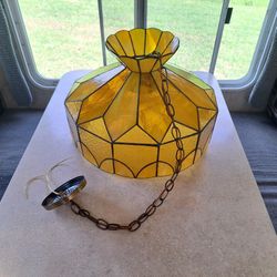 Tiffany & Co.-style hanging lamp with a yellow stained glass shade