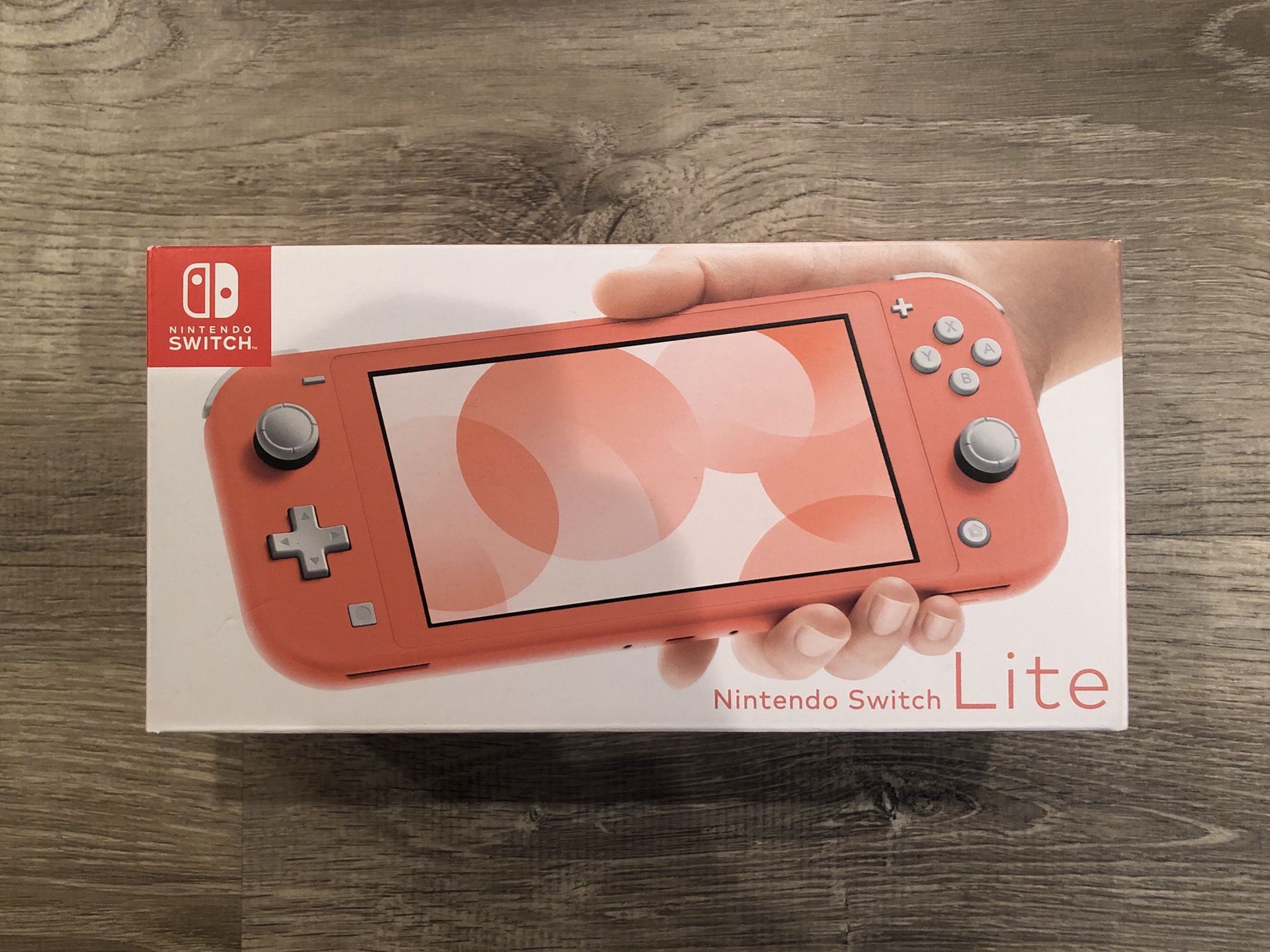 Nintendo Switch Lite Coral / Pink