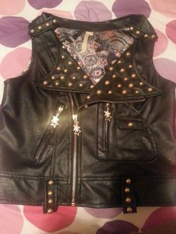 Black and gold leather vest