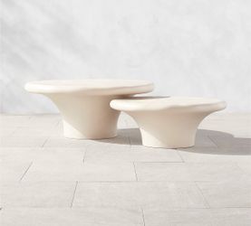 CB2 2-Piece Pompeo Round Ivory Cast Resin Nesting Indoor/Outdoor Coffee Table Set