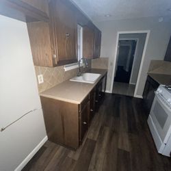 Kitchen Cabinets Counter Tops And  Sink 