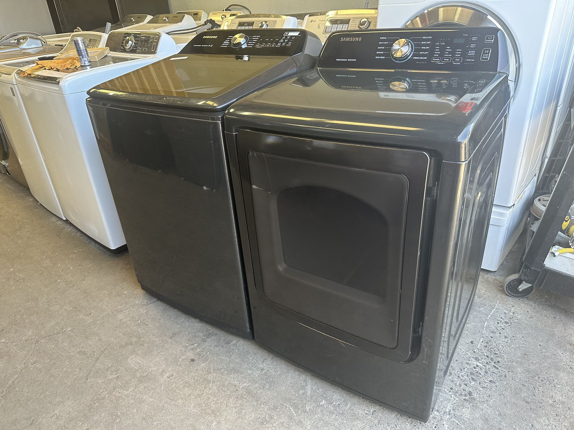 Three year old Topload black Samsung energy star Washer dryer set gas dryer can deliver retails at $1,850