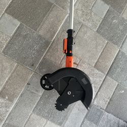 Lawn edger with blade, only used 2 times and has replacement blade.