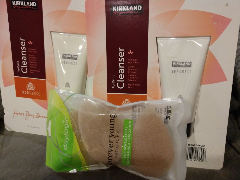 2-kirkland purifying cleansers and 1 pk Nat puffs