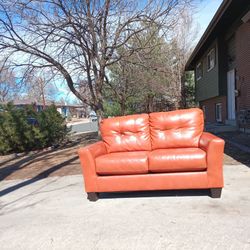 Orange Leather Loveseat 