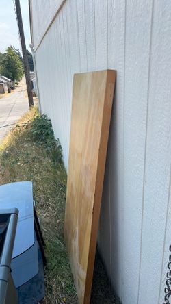 Free solid wood desk top.  No legs