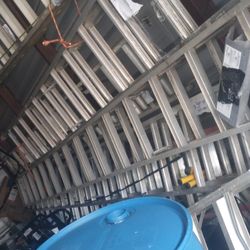 Tons of Light weight Aluminum extension ladders