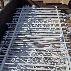 Metal panels.
Four feet tall buy ten feet long