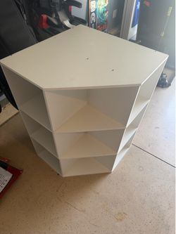 Corner book shelf $60