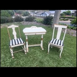 Timeworn vintage petite French desk with chair plus a companions chair.