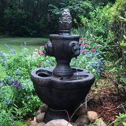 Outdoor Water Fountain New in Original Packaging With 2 Tiers and Ornate Lion Heads.